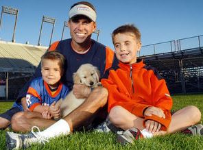 Chris Petersen with Children}}