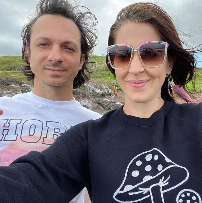 Abby Martin with her partner, Michael Prysner. | Source: Instagram