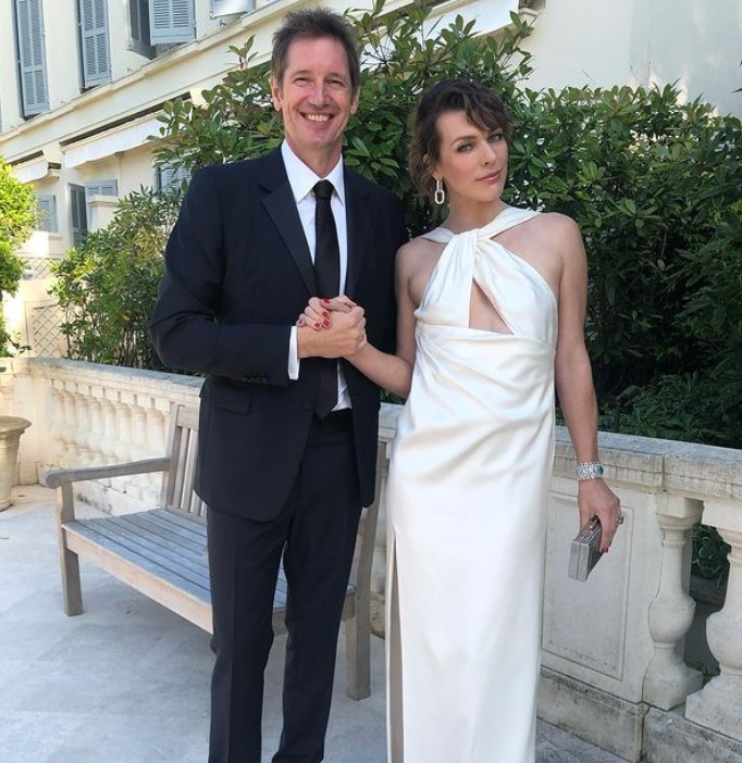 Milla Jovovich with her husband Paul | Source: Milla's Instagram
